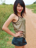 Hung ladyboy Gold exposing her lean body outdoors